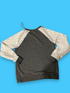 Rubynee Vintage y2k top in grey and white with skull symbol